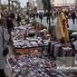 بساط‌ نان در سنگفرش انقلاب؛ روایتی از تقلای زنان دستفروش در قلب پایتخت
